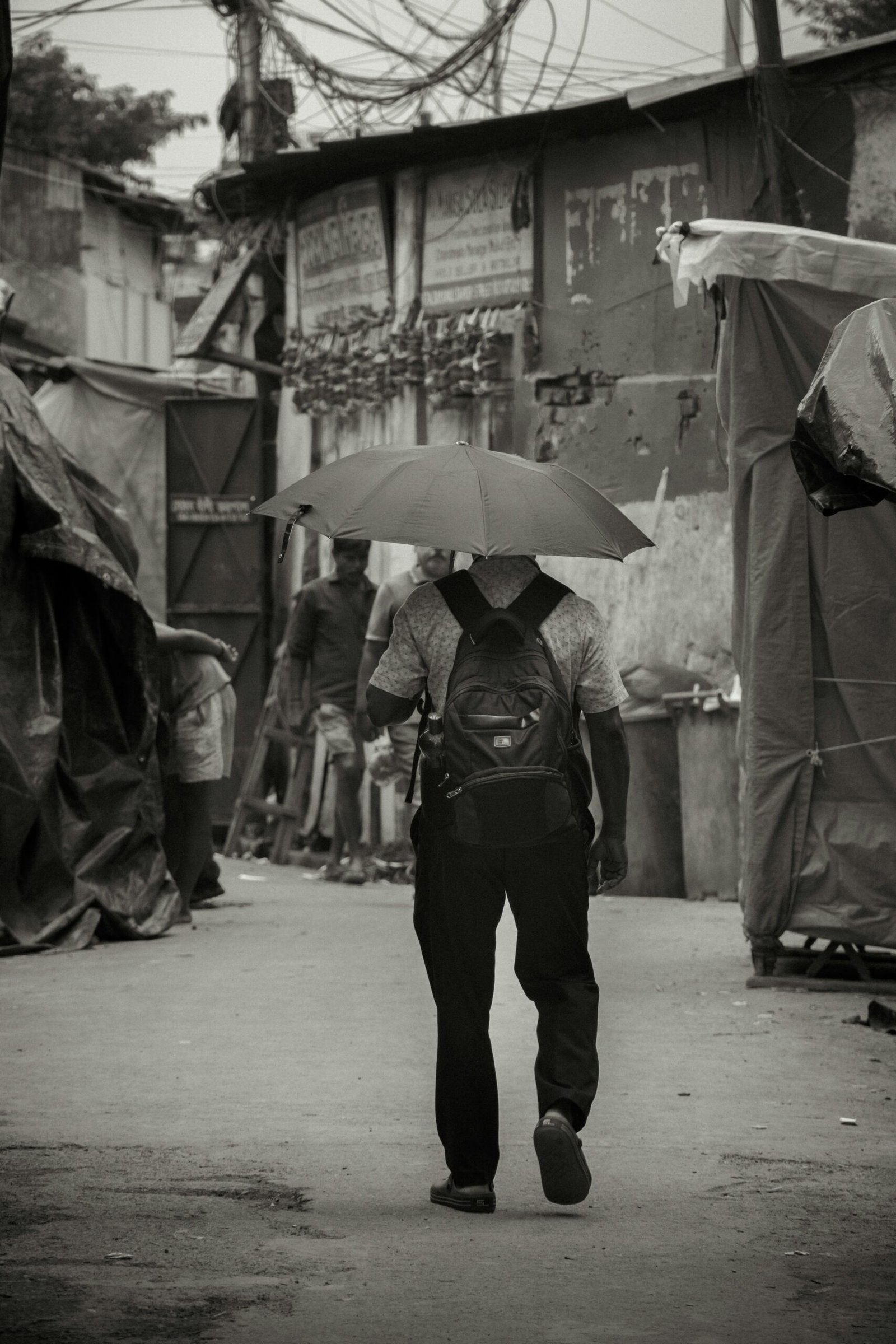 a person walking with an umbrella